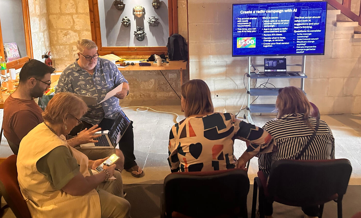 Five participants work together during an EDreframe Erasmus Days workshop in Gozo.